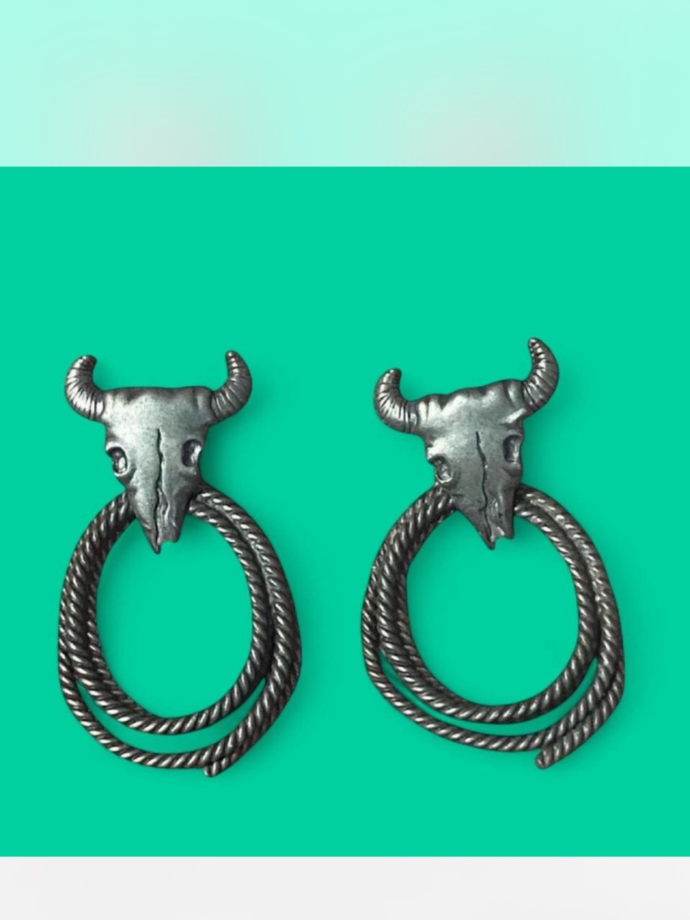 Vintage bold bull skull studs with twisted rope hoop design